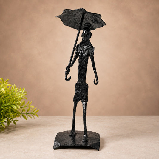 Sthula's Handmade Black Metal Man With Umbrella Figurine