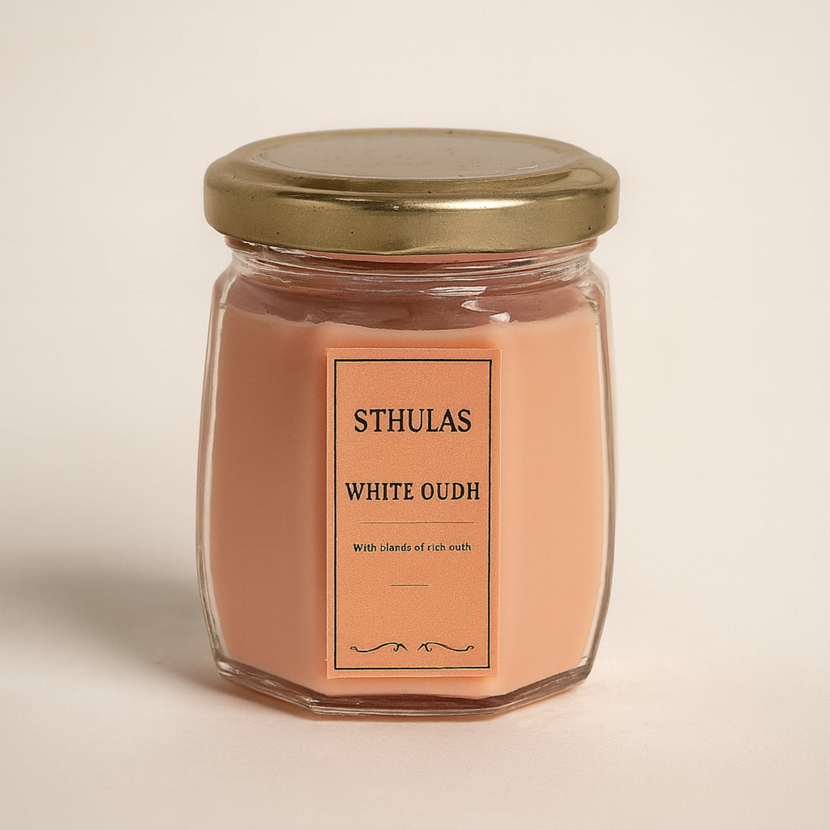 Sthula's White Oudh Scented Candle – Peach Glass Jar