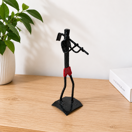 Sthula's Handmade Black and Red Metal Flute Player Figurine