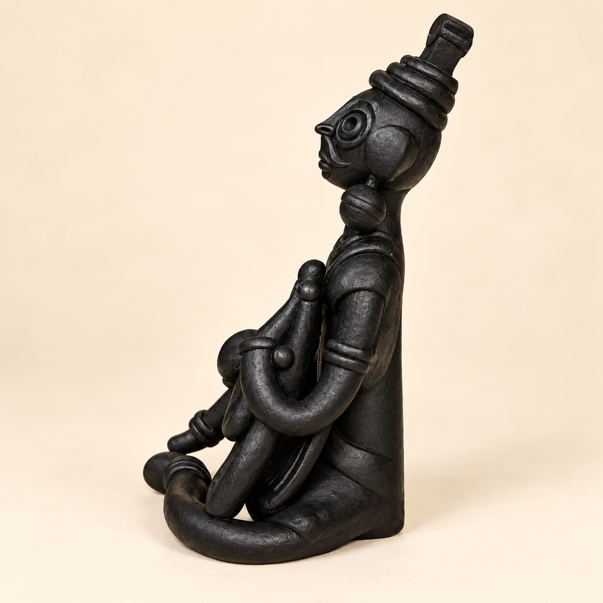 Sthula's Handmade Black Terracotta Tribal Musician