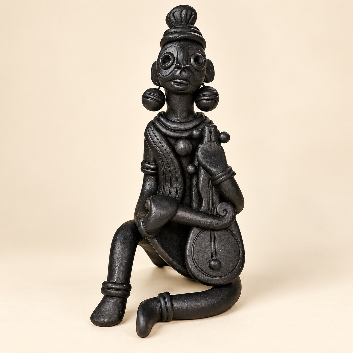 Sthula's Handmade Black Terracotta Tribal Musician