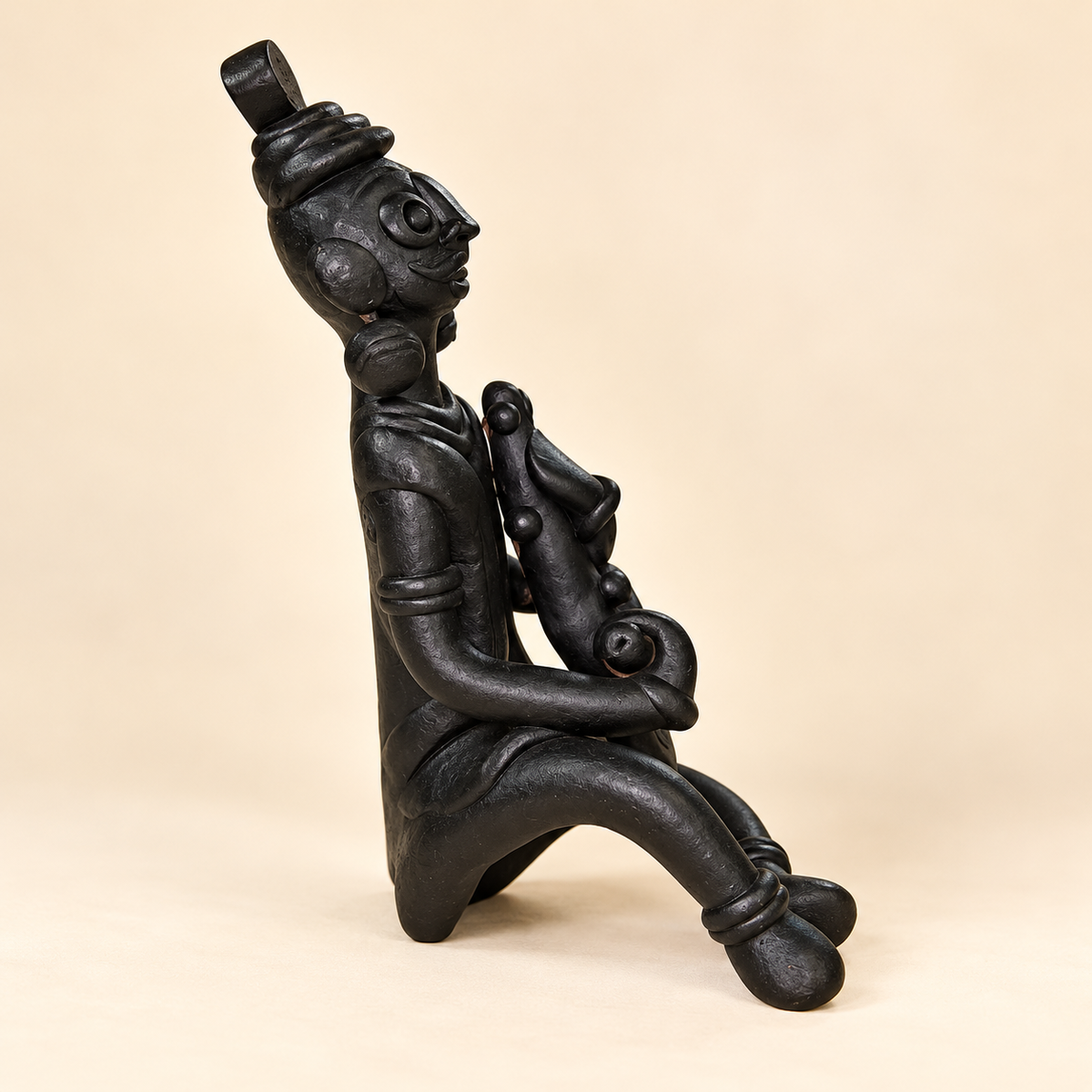 Sthula's Handmade Black Terracotta Tribal Musician