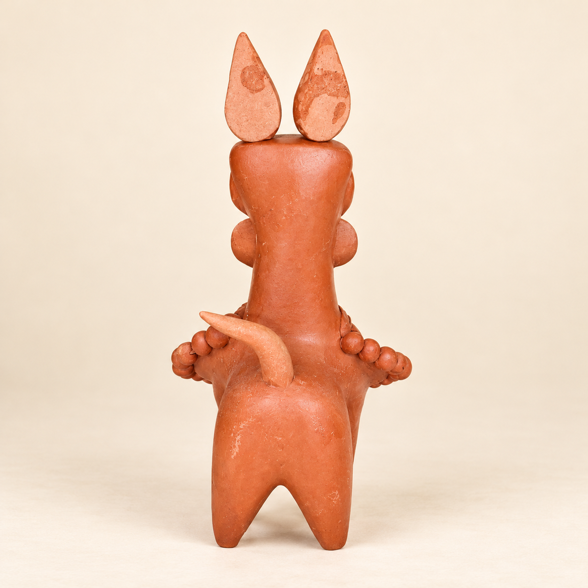 Sthula's Handmade Terracotta Orange Tribal Figurine
